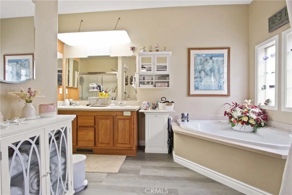 4095 Fruit La, Unit 743 La Verne, CA 91750 - Photo 16 of 21 a kitchen with a sink stove and cabinets