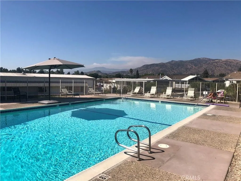 4095 Fruit La, Unit 743 La Verne, CA 91750 - Photo 21 of 21 a view of houses with swimming pool and yard