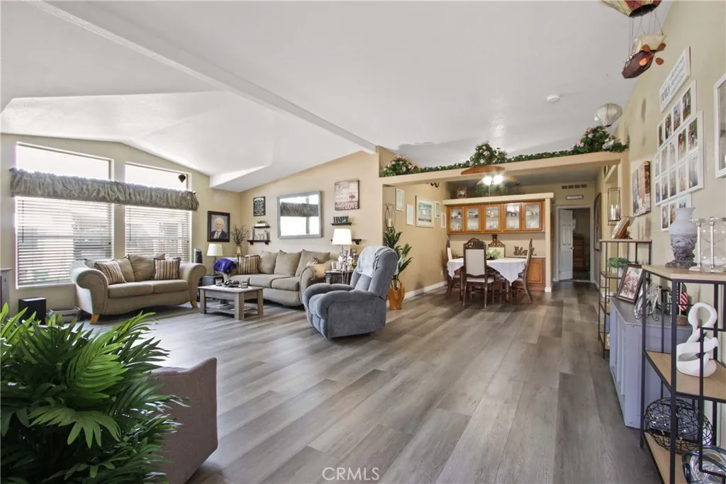 4095 Fruit La, Unit 743 La Verne, CA 91750 - Photo 4 of 21 a living room with furniture and a wooden floor