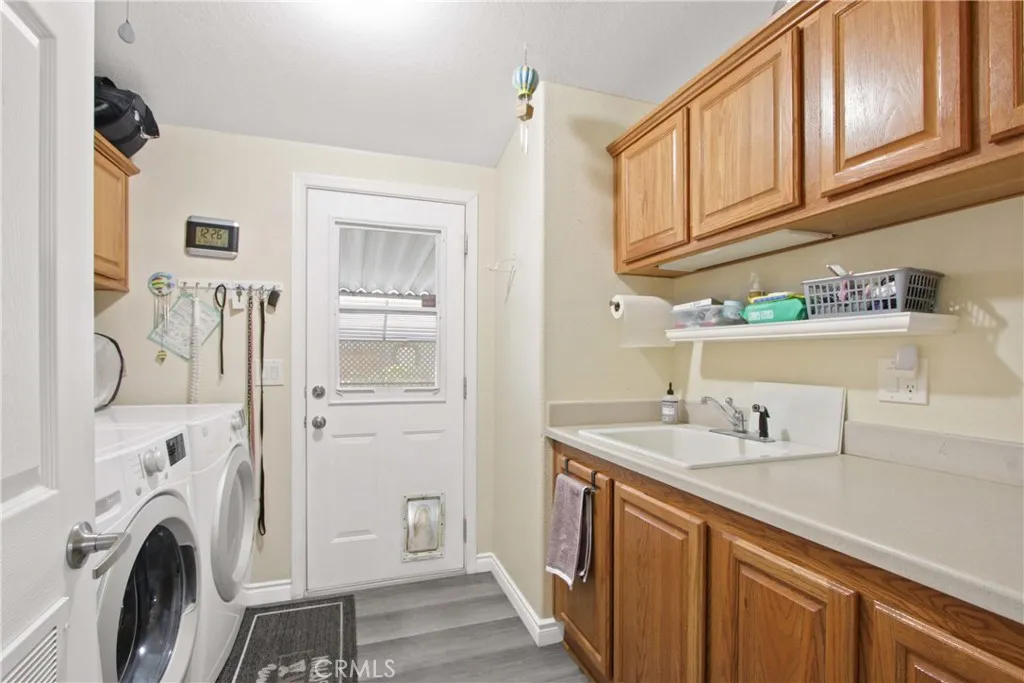 4095 Fruit La, Unit 743 La Verne, CA 91750 - Photo 10 of 21 a kitchen with stainless steel appliances granite countertop a sink and a refrigerator