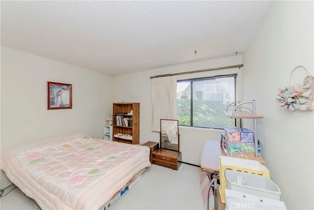 a bathroom with a shower and a shower curtain