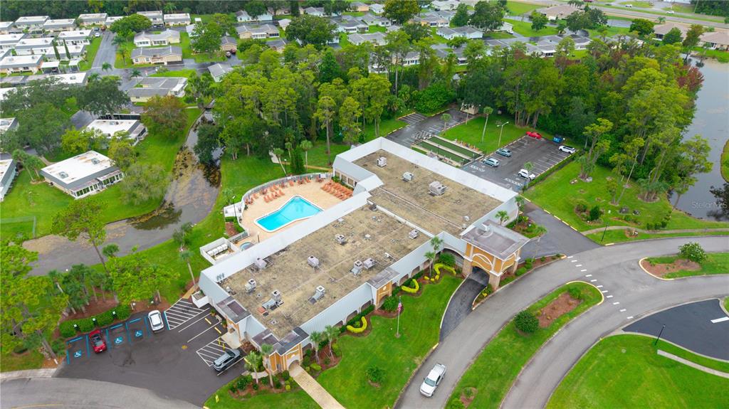 11719 Rose Tree Drive New Port Richey, FL 34654 - Photo 39 of 51 an aerial view of a house with a garden