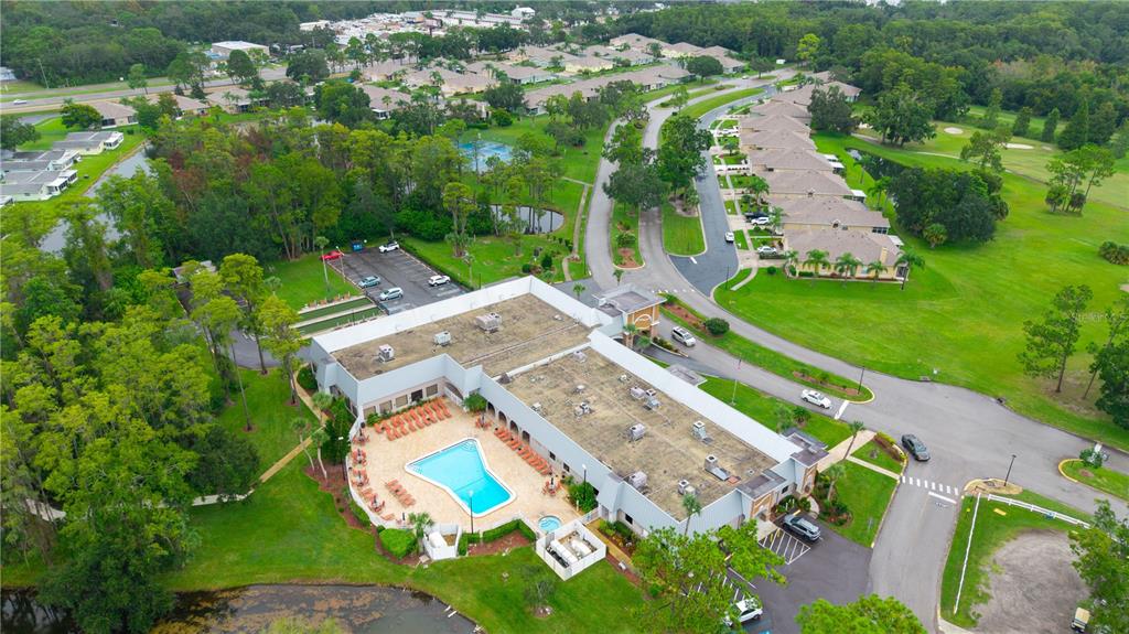 11719 Rose Tree Drive New Port Richey, FL 34654 - Photo 40 of 51 an aerial view of a house with a yard