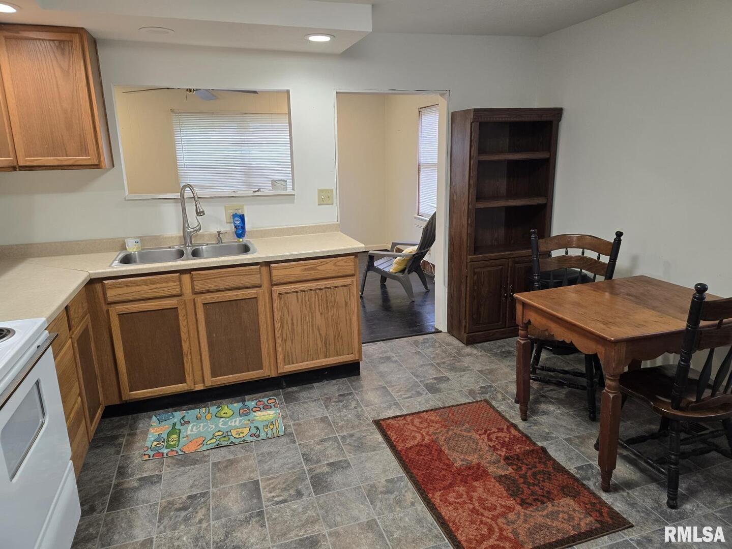 505 South 2nd Street Marion, IL 62959 - Photo 5 of 21 a kitchen with a sink and cabinets