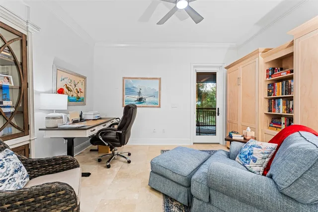 a workspace with a couch and a window