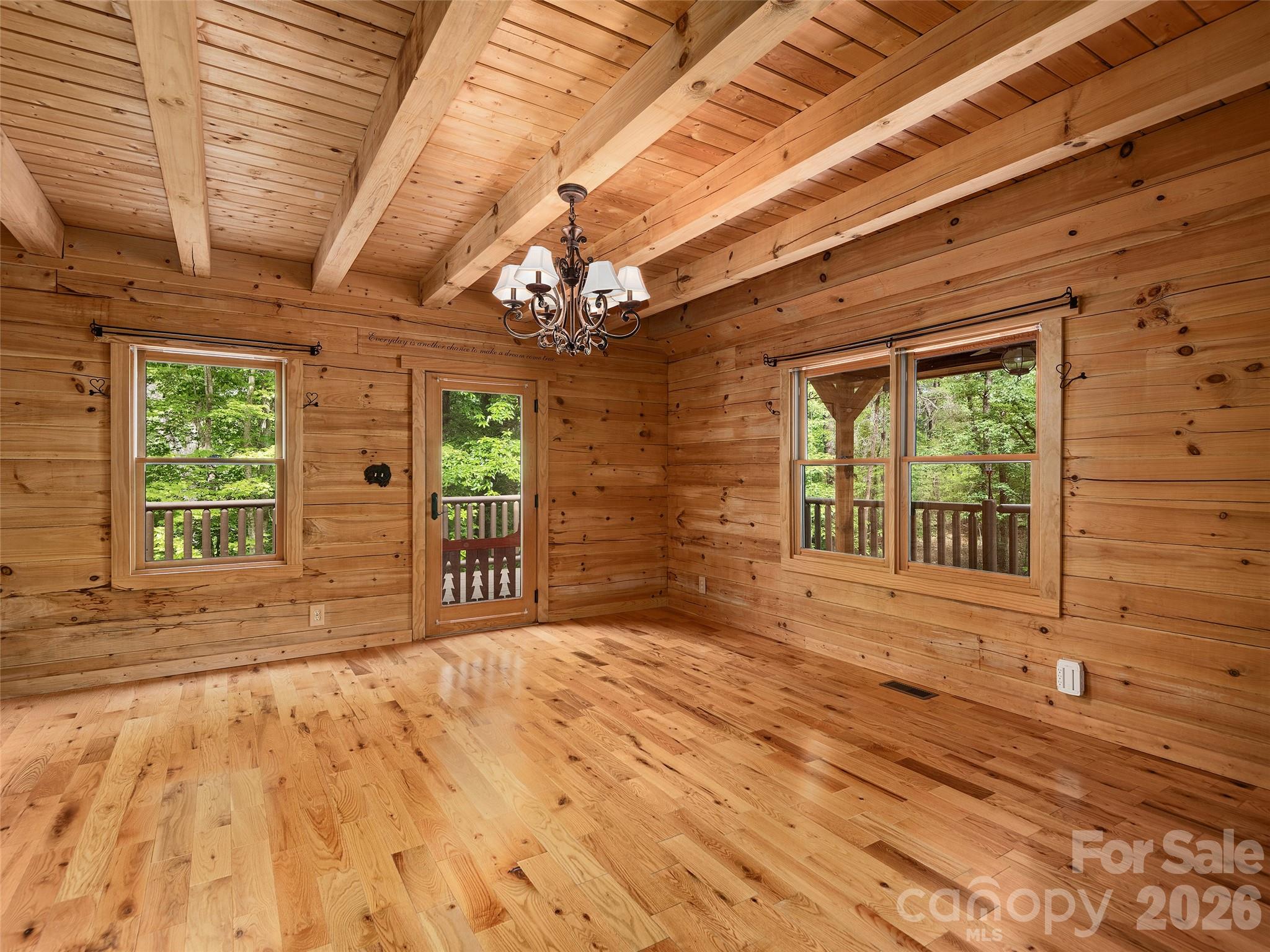 413 Green Hills Road Mill Spring, NC 28756 - Photo 17 of 48 a view of a room with a large window