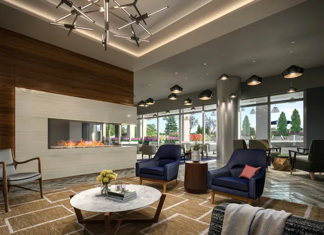 a living room with furniture and a table