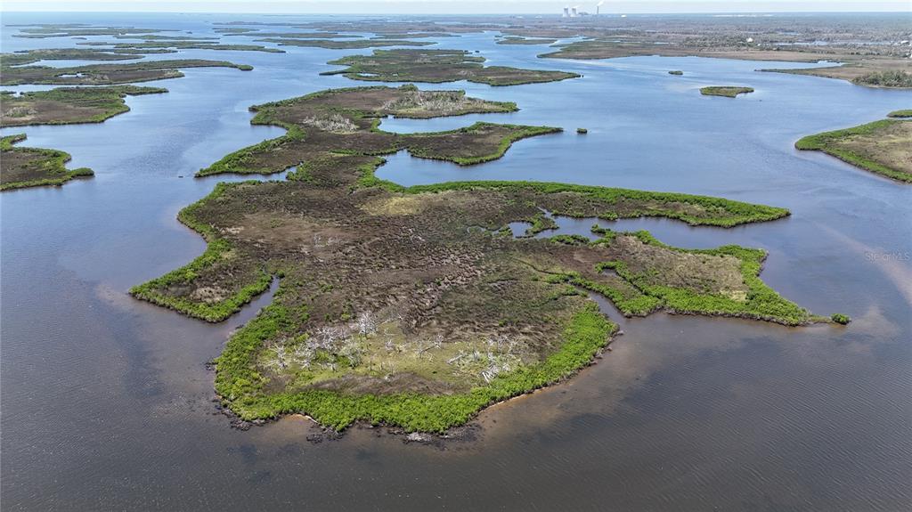 12301 The Salt Crystal River Crystal River, FL 34429 - Photo 32 of 36 a view of a lake with outdoor space