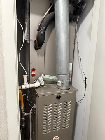 a bathroom with a sink mirror and vanity