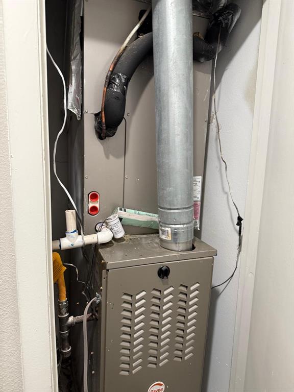 925 Bluewood Drive Dallas, TX 75232 - Photo 11 of 33 a bathroom with a sink vanity and a mirror