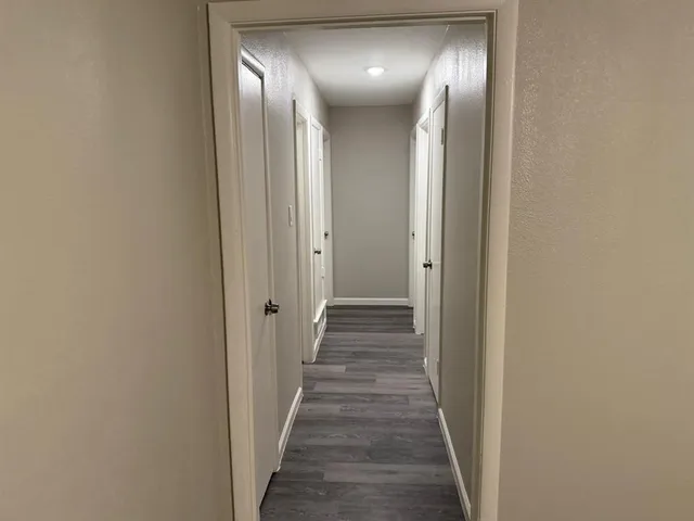 a bathroom with a sink vanity and a mirror