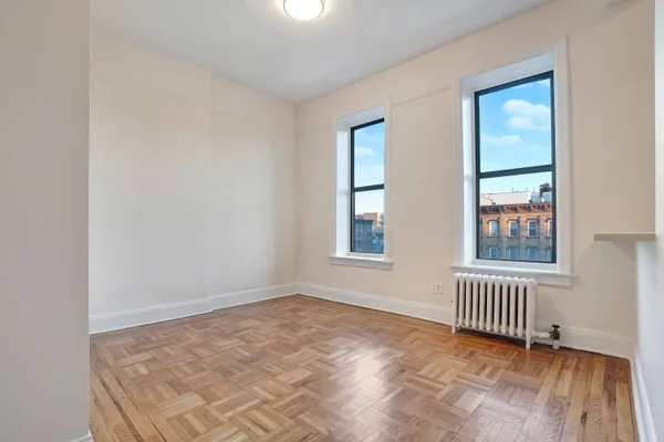 an empty room with windows