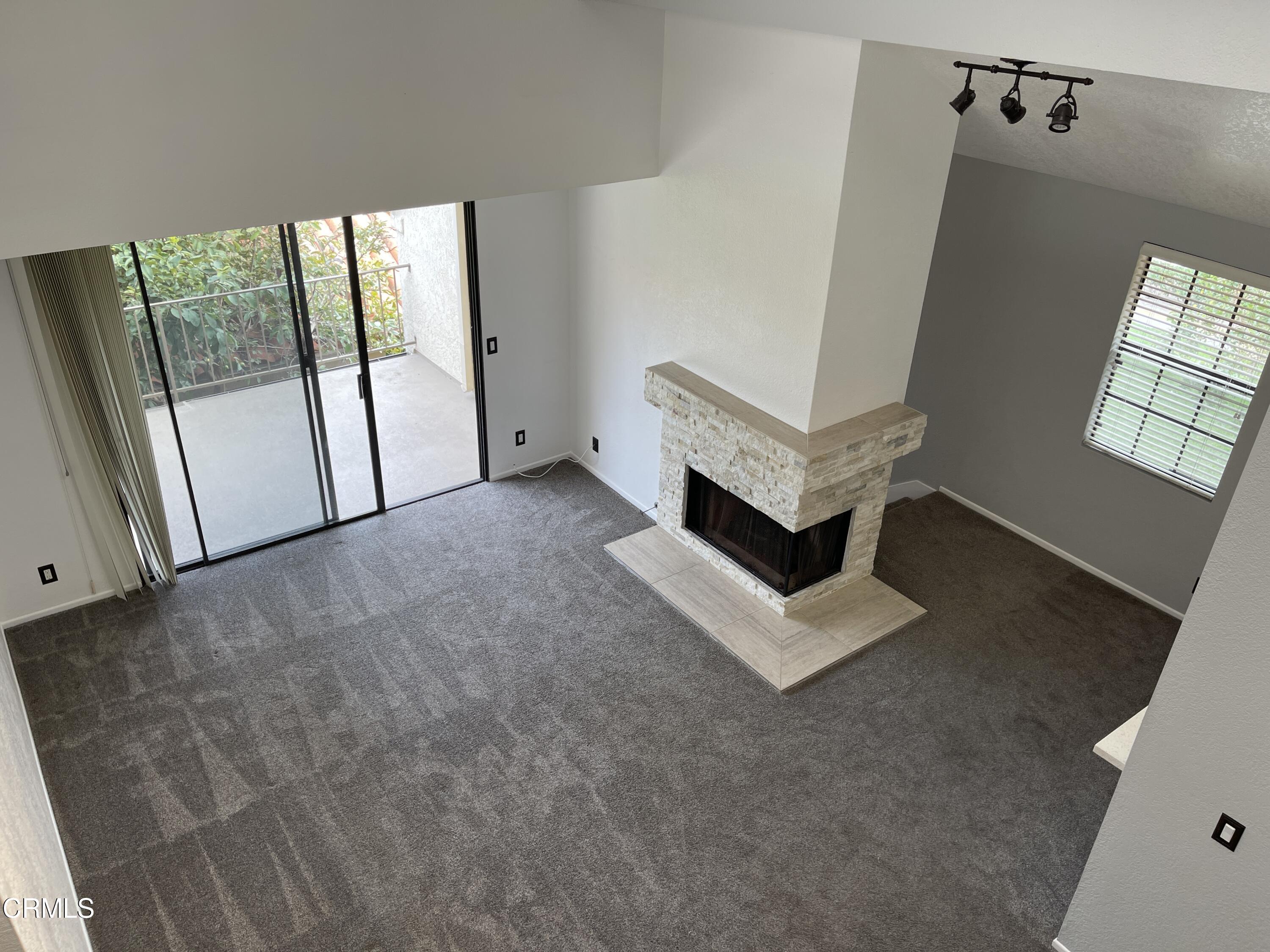 2257 Martinique Lane Oxnard, CA 93035 - Photo 27 of 52 a living room with furniture and a window