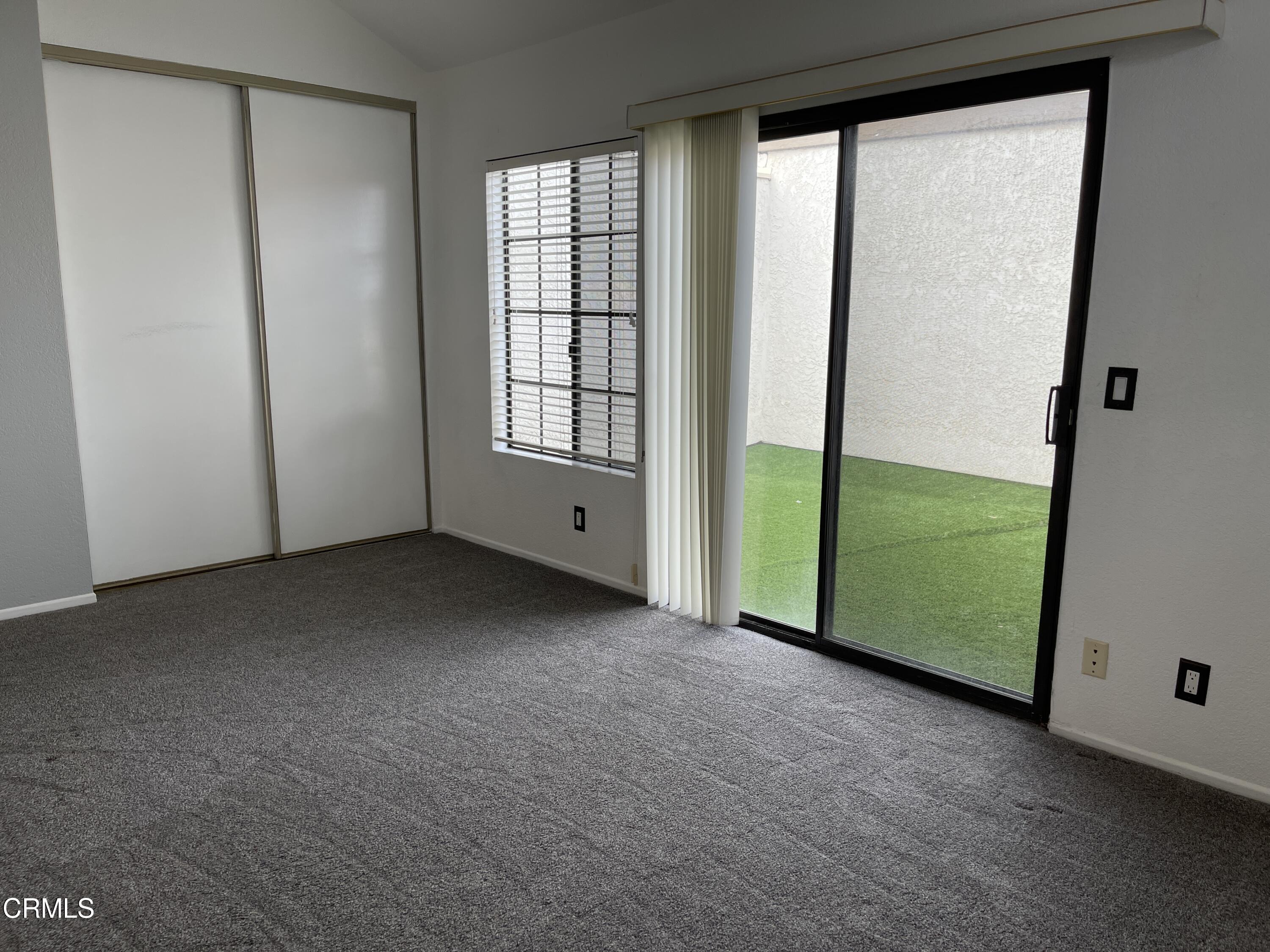 2257 Martinique Lane Oxnard, CA 93035 - Photo 30 of 52 a view of an empty room with a window