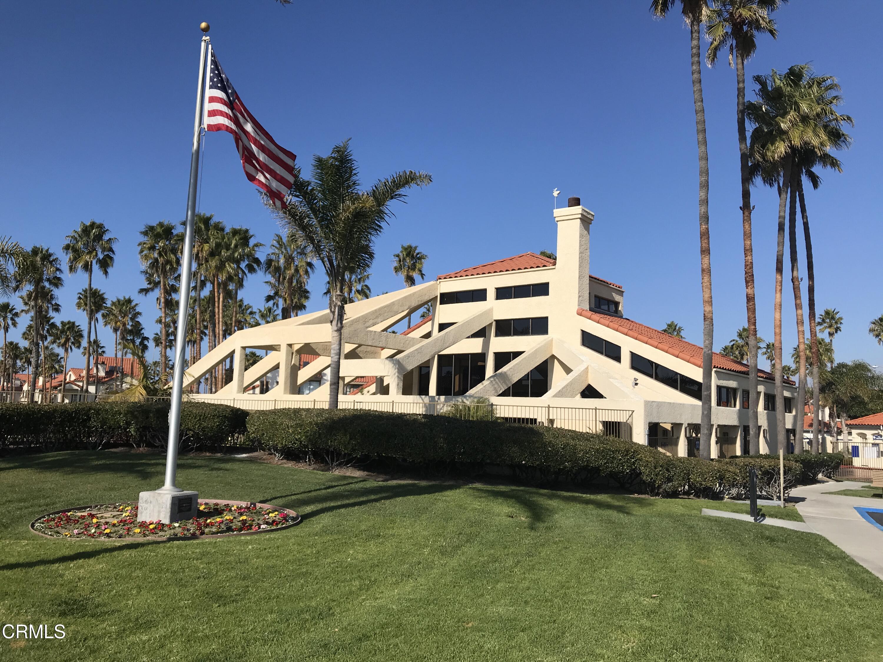 2257 Martinique Lane Oxnard, CA 93035 - Photo 34 of 52 a front view of a house with a yard and tub