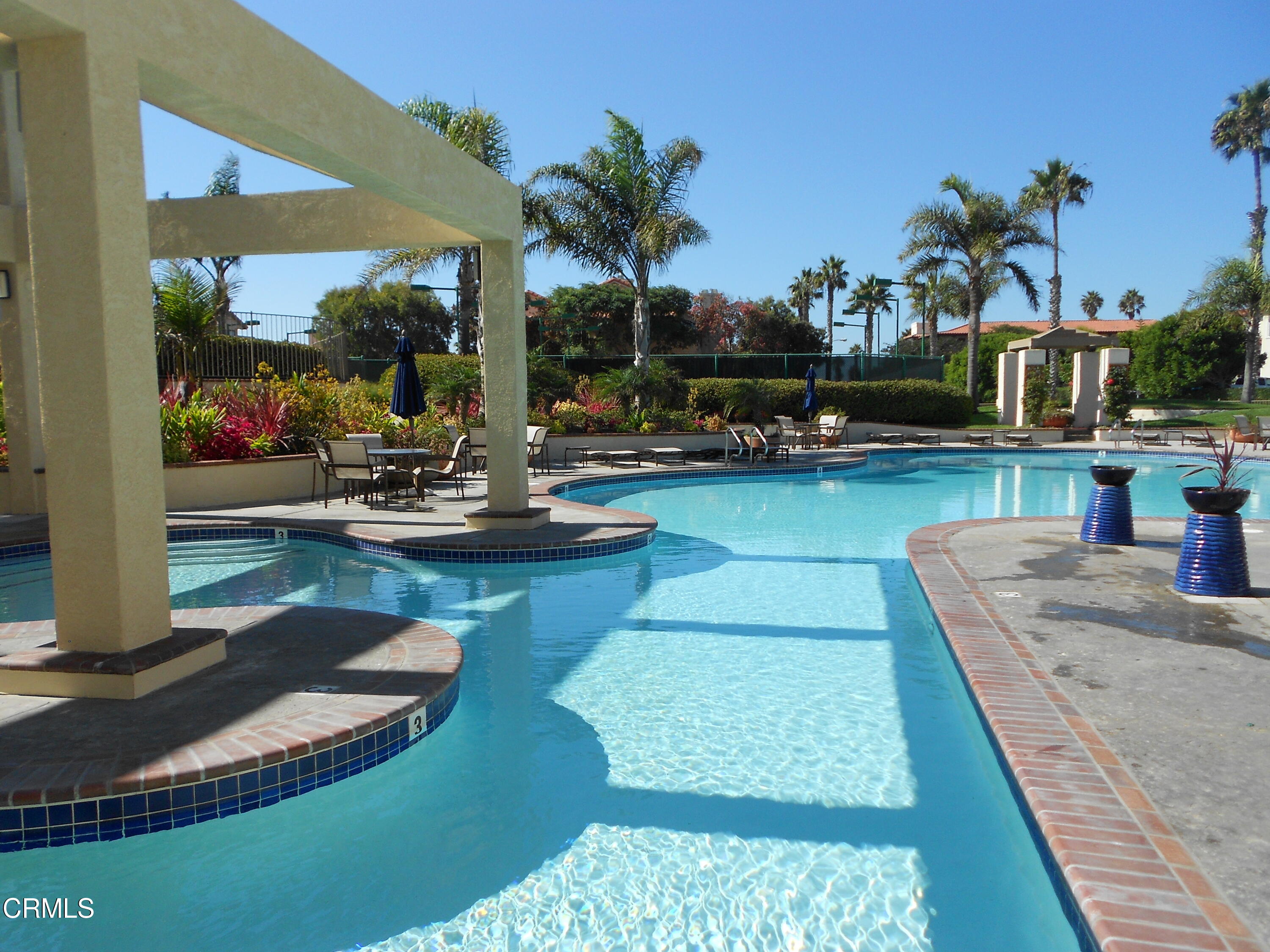 2257 Martinique Lane Oxnard, CA 93035 - Photo 37 of 52 a view of a swimming pool with outdoor seating