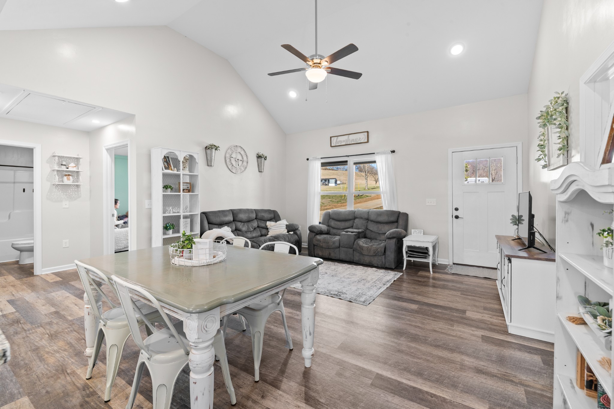2023 Coleman Road Cornersville, TN 37047 - Photo 14 of 80 a living room with furniture a table and wooden floor