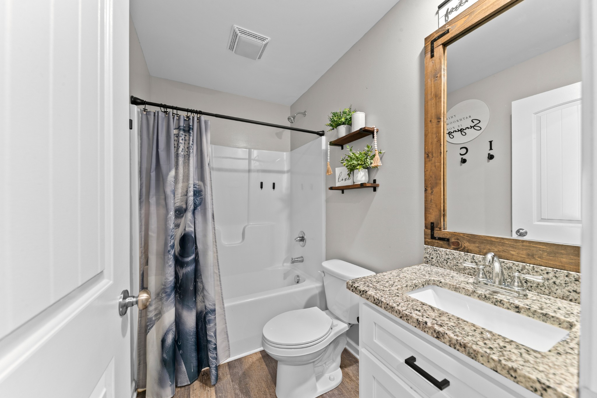 2023 Coleman Road Cornersville, TN 37047 - Photo 40 of 80 a bathroom with a granite countertop sink toilet and shower