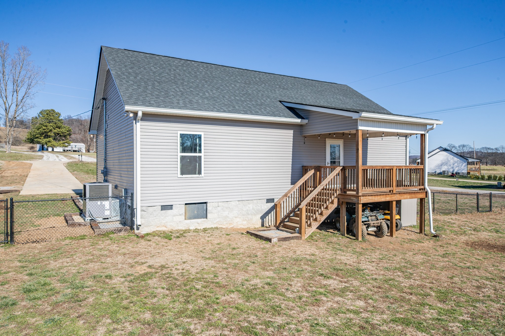 2023 Coleman Road Cornersville, TN 37047 - Photo 47 of 80 a view of a house with a backyard
