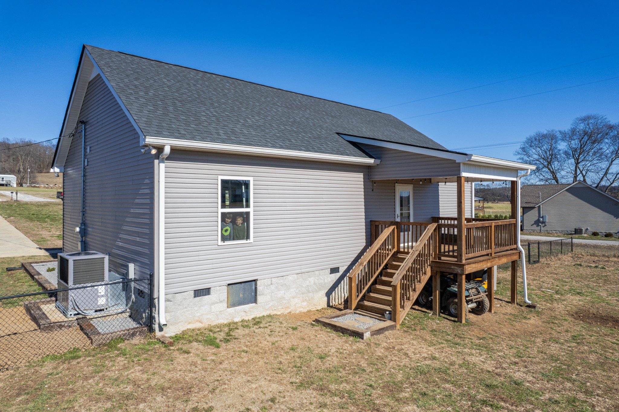 2023 Coleman Road Cornersville, TN 37047 - Photo 52 of 80 a view of a house with a wooden bench