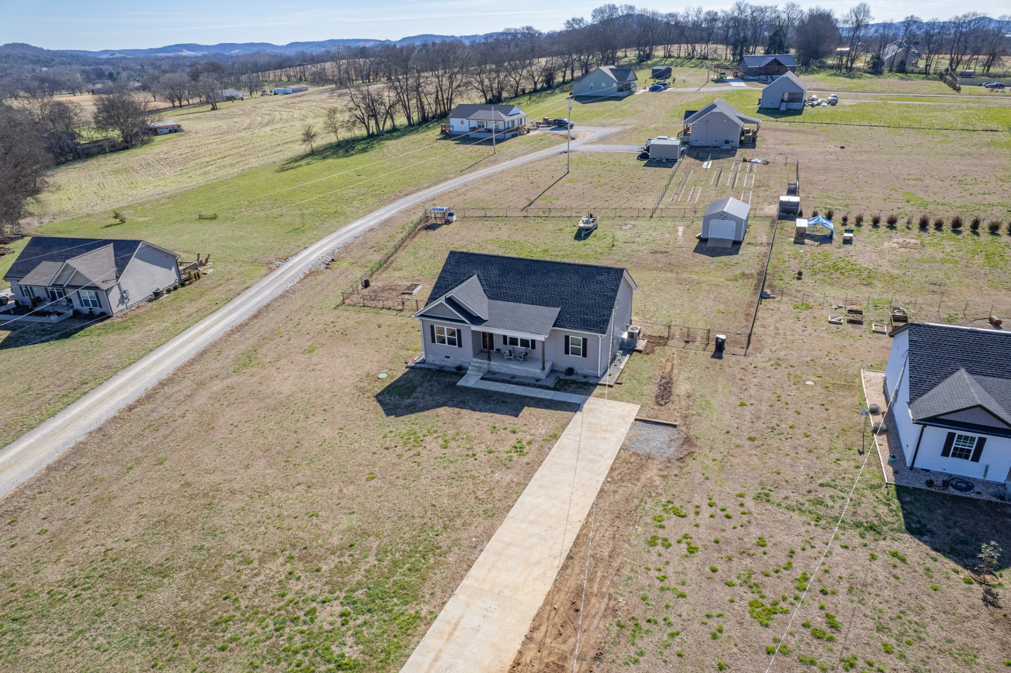 2023 Coleman Road Cornersville, TN 37047 - Photo 61 of 80 an aerial view of a house with a garden
