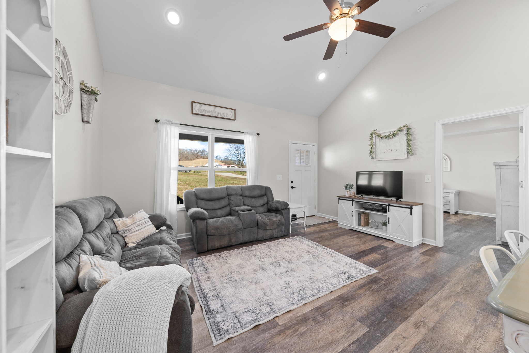 2023 Coleman Road Cornersville, TN 37047 - Photo 9 of 80 a living room with furniture and a flat screen tv
