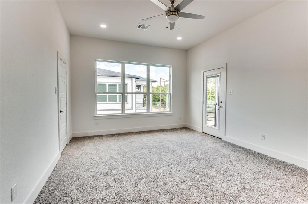 7307 Rubio Place Dallas, TX 75235 - Photo 10 of 17 a view of an empty room with a window
