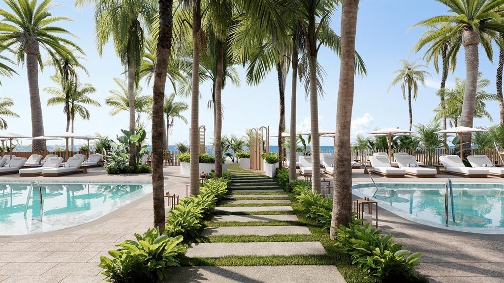 900 North Ocean Boulevard, Unit 906 Pompano Beach, FL 33062 - Photo 24 of 33 a view of a yard with palm trees