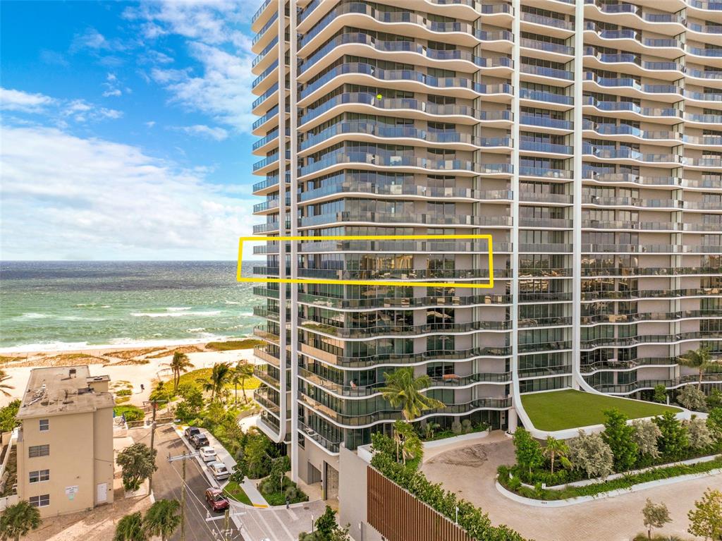 900 North Ocean Boulevard, Unit 906 Pompano Beach, FL 33062 - Photo 31 of 33 a view of a balcony with chair and the potted plants