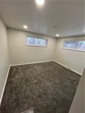 an empty room with a hallway