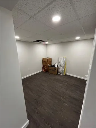 an empty room with chairs