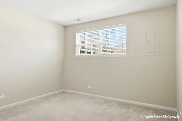 a view of kitchen with stainless steel appliances