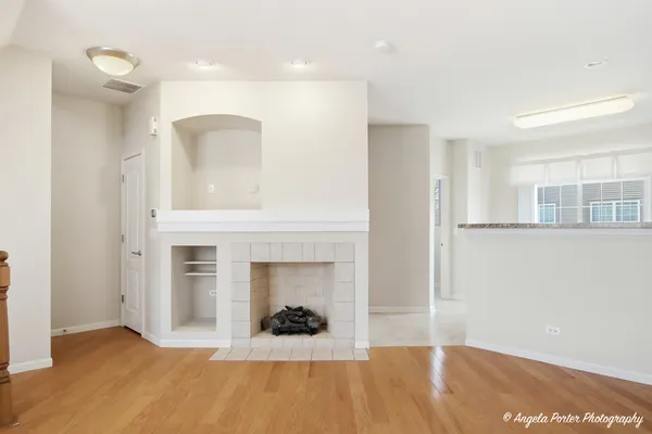 a view of a livingroom with a fireplace