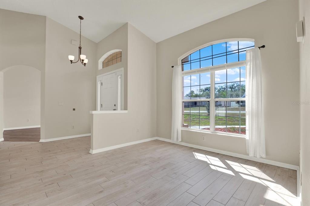 4400 Dior Road Spring Hill, FL 34609 - Photo 5 of 37 a view of an empty room with a window