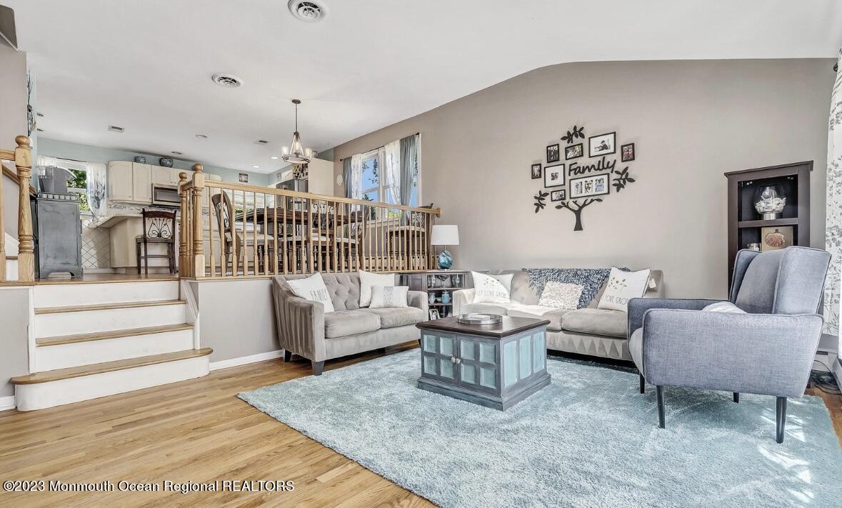 32 Eisele Avenue Asbury Park, NJ 07712 - Photo 6 of 16 a living room with furniture and a rug