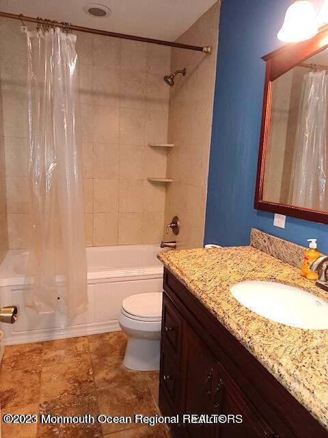 32 Eisele Avenue Asbury Park, NJ 07712 - Photo 10 of 16 a bathroom with a granite countertop sink toilet and shower