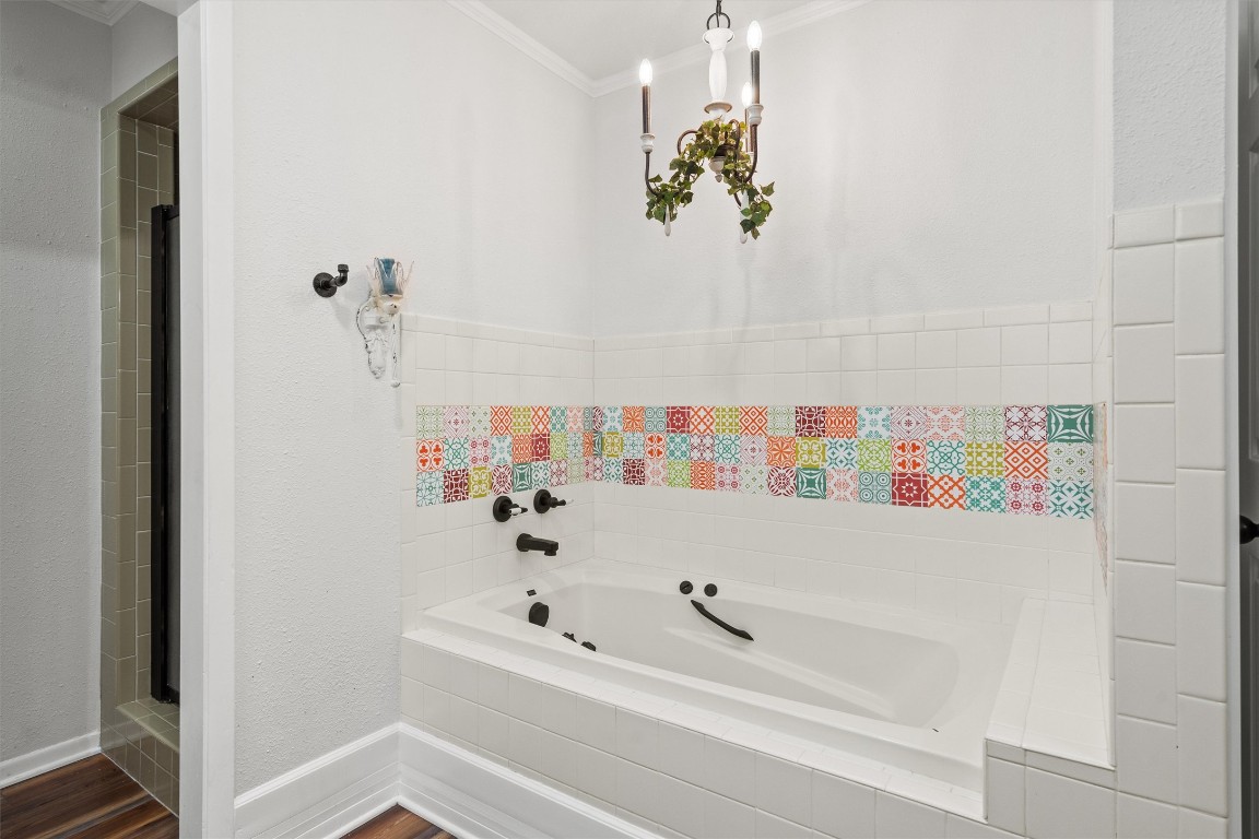 4101 Briar Cliff Road Temple, TX 76502 - Photo 31 of 40 a bathroom with a bathtub and a shower