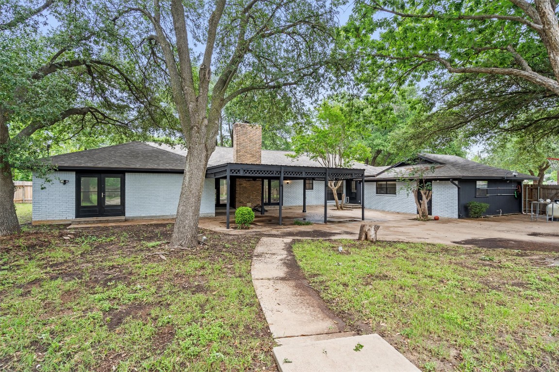 4101 Briar Cliff Road Temple, TX 76502 - Photo 37 of 40 a front view of a house with garden