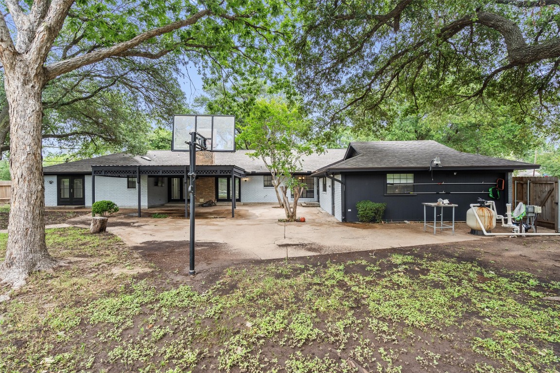 4101 Briar Cliff Road Temple, TX 76502 - Photo 38 of 40 a front view of a house with a yard tree and outdoor seating