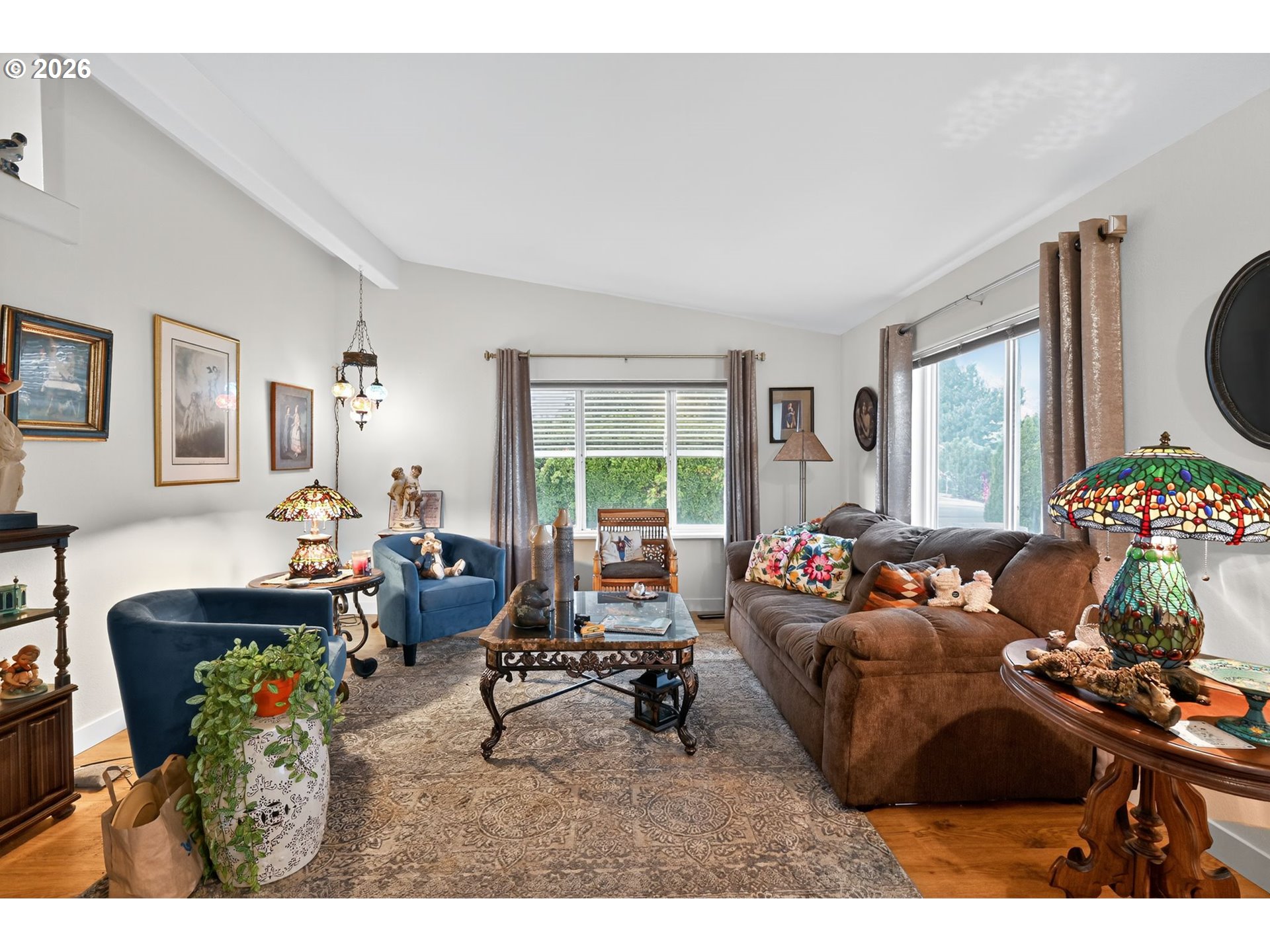 1620 Northeast 6th Street Redmond, OR 97756 - Photo 11 of 25 a living room with furniture and a large window
