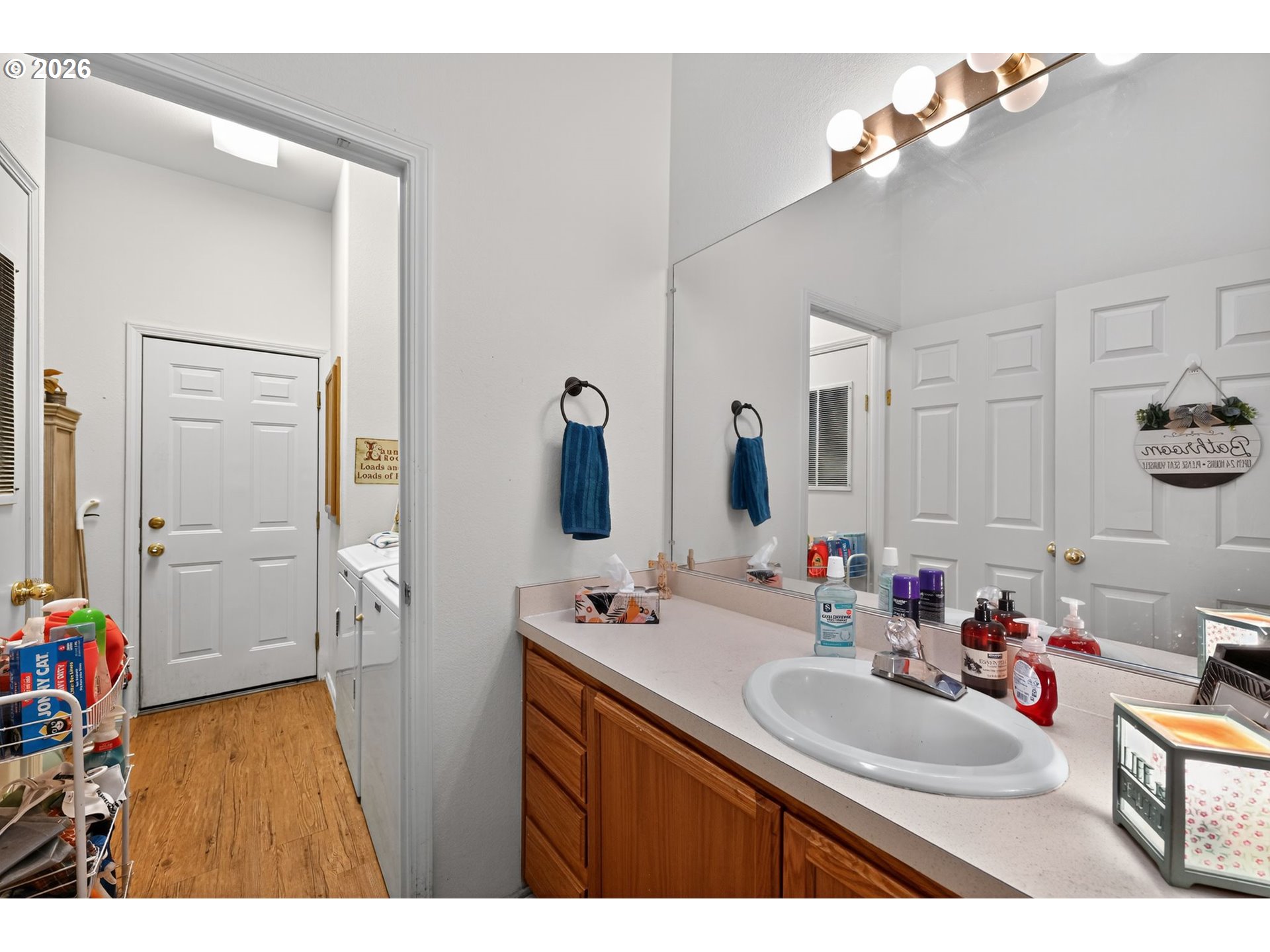 1620 Northeast 6th Street Redmond, OR 97756 - Photo 18 of 25 a bathroom with a sink vanity granite and a mirror