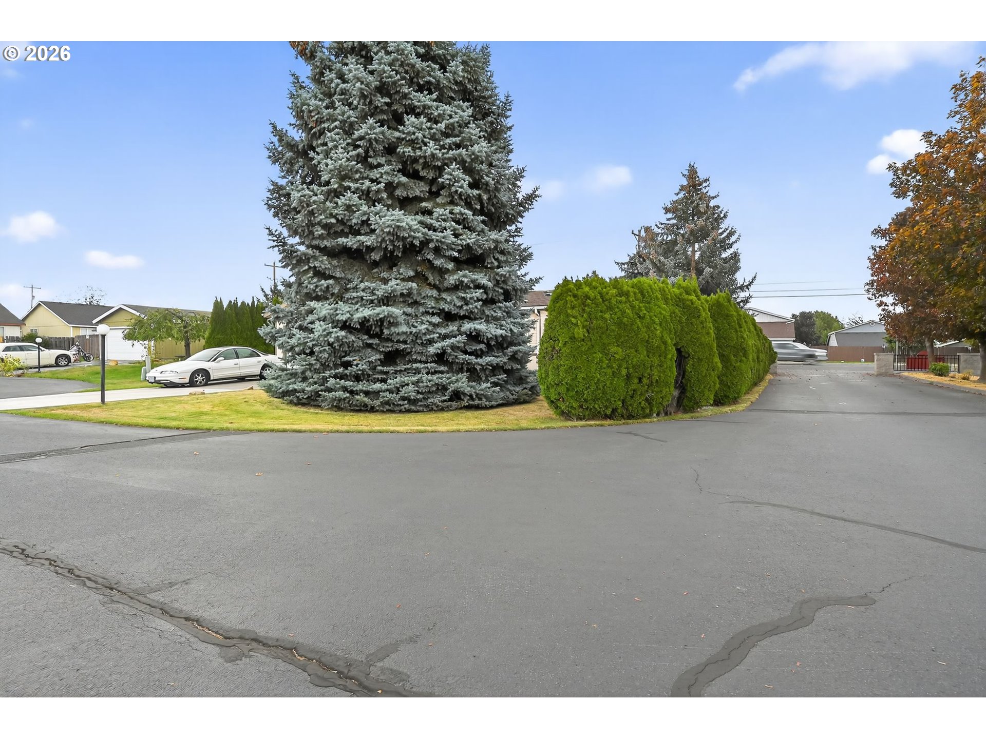 1620 Northeast 6th Street Redmond, OR 97756 - Photo 3 of 25 a view of a road with a building in the background