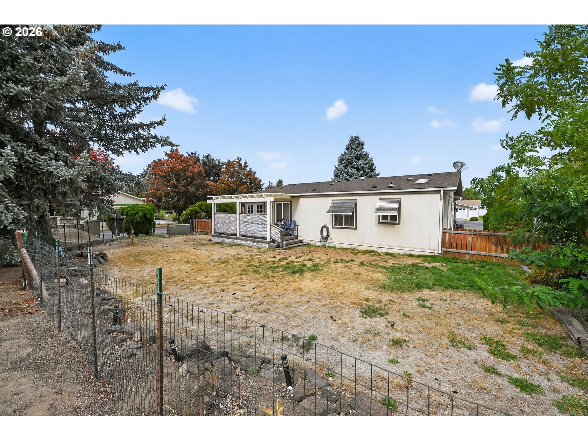 1620 Northeast 6th Street Redmond, OR 97756 - Photo 8 of 25 a house view with a backyard space