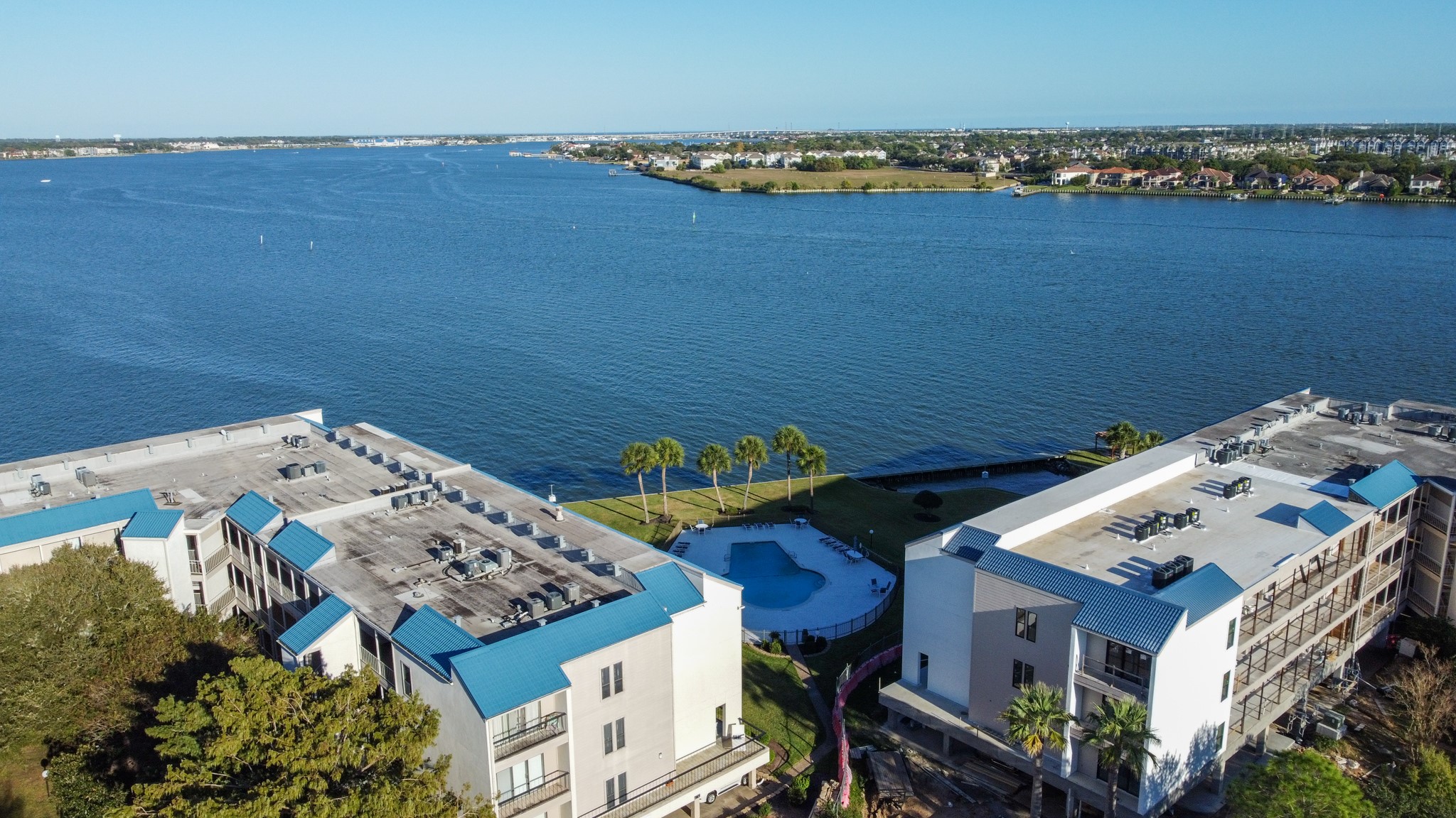 351 Lakeside Lane, Unit 305 Nassau Bay, TX 77058 - Photo 31 of 32 an aerial view of a house with a ocean view