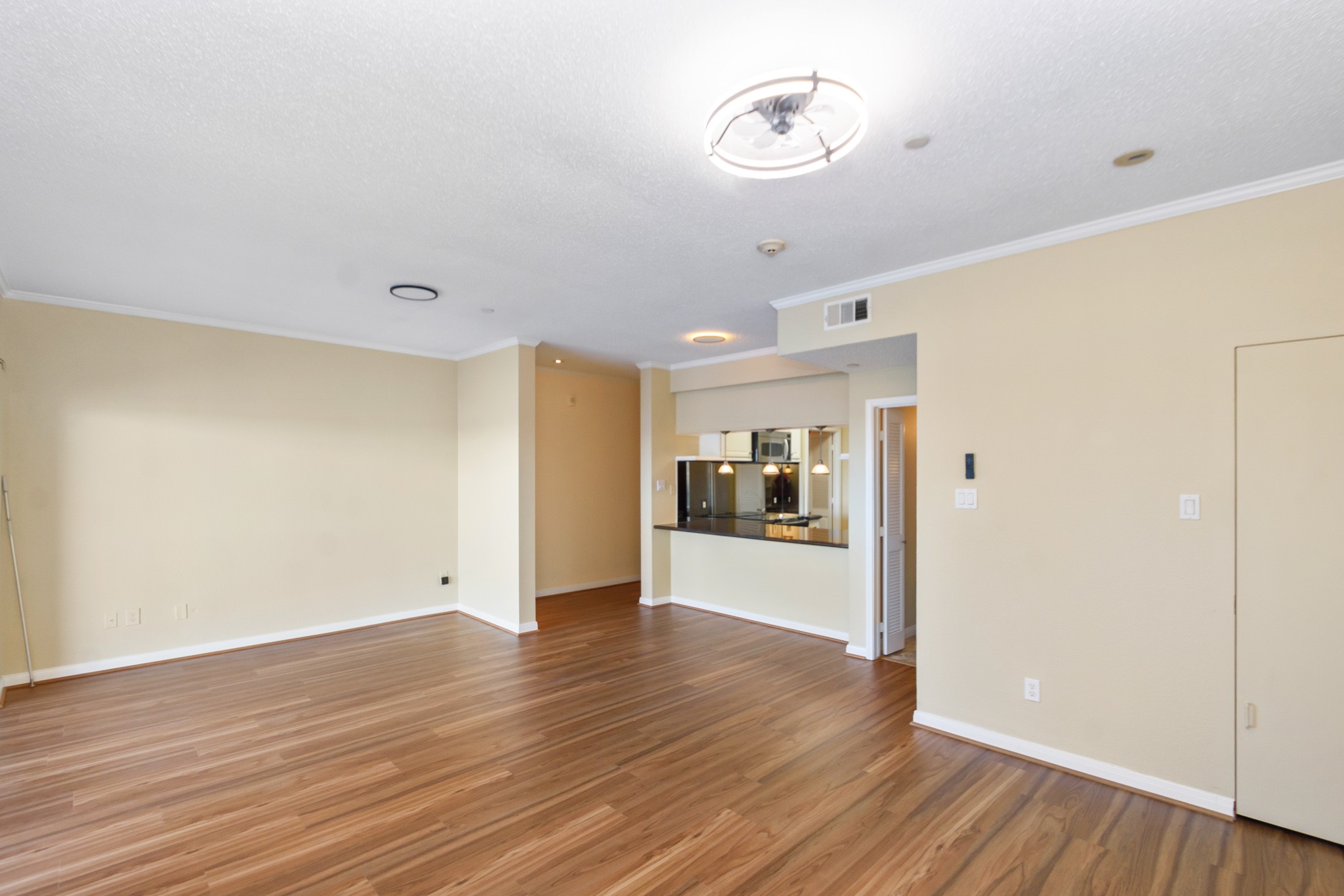 351 Lakeside Lane, Unit 305 Nassau Bay, TX 77058 - Photo 6 of 32 a view of a livingroom with wooden floor
