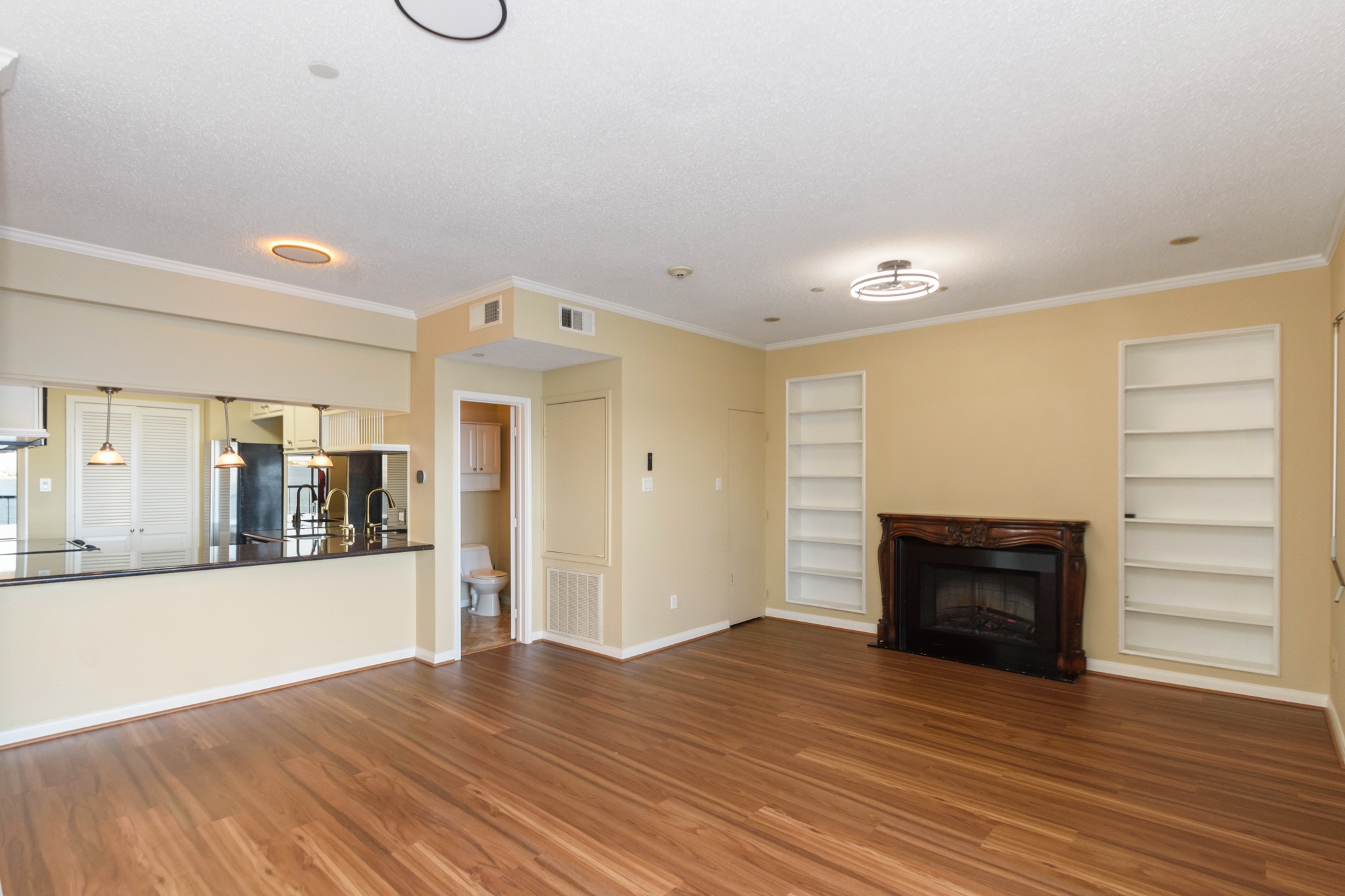351 Lakeside Lane, Unit 305 Nassau Bay, TX 77058 - Photo 7 of 32 a view of a livingroom with wooden floor