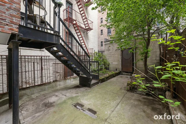 a view of entryway with a tree