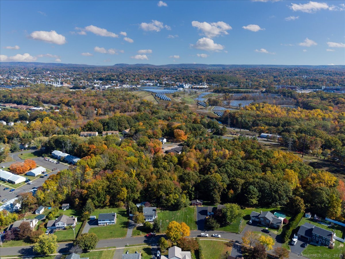 36 R Nod Brook Road Wallingford, CT 06492 - Photo 5 of 13 an aerial view of a city with lots of residential buildings