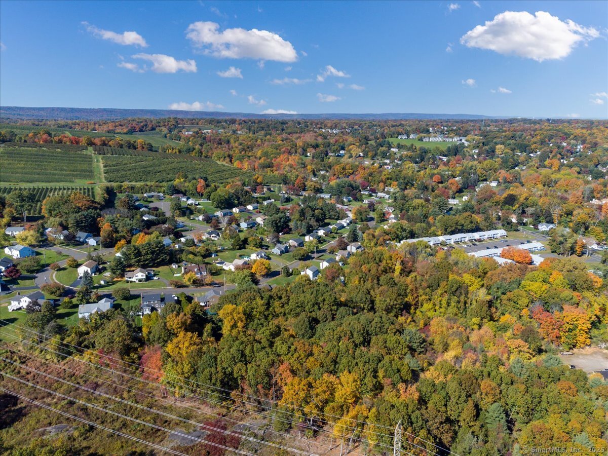 36 R Nod Brook Road Wallingford, CT 06492 - Photo 7 of 13 a view of a city with a houses