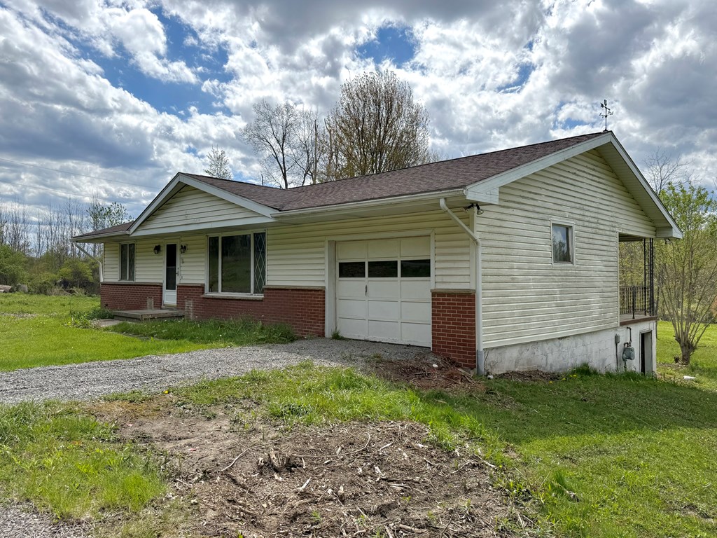 527 Heckathorn Church Road Seneca, PA 16346 - Photo 5 of 13 a view of a house with a yard